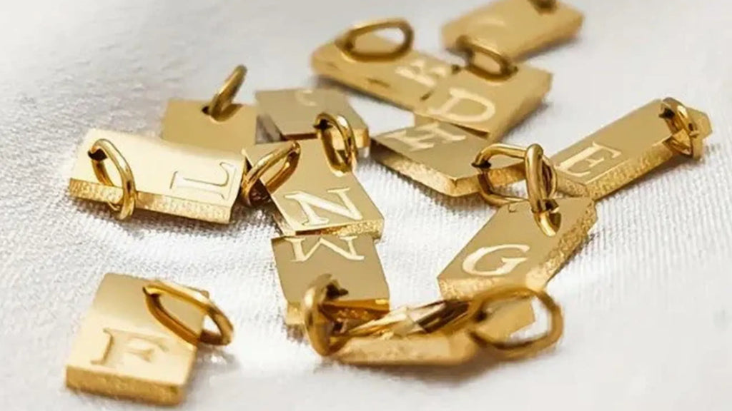 How to Apply Your Mariposa Initial Pendant Charm to Your Necklace: A Step-by-Step Guide