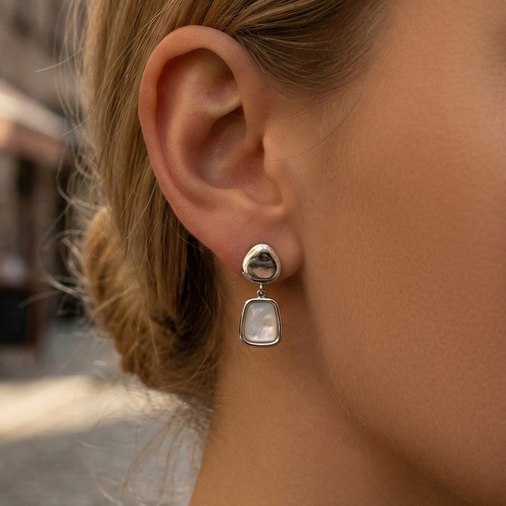 Gardenia Mother of Pearl drop earrings in gold and silver by Wyldflower Jewellery
