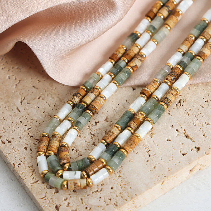 Acacia jade stone bead necklace with green cream and gold accents