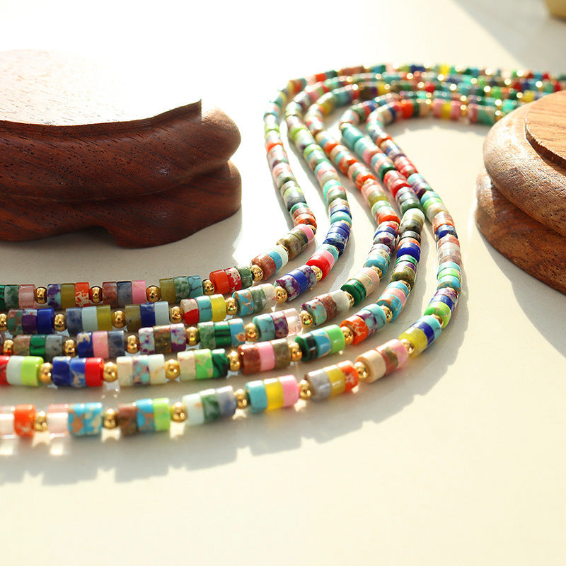 Bright multitone beaded necklace with polished gold details