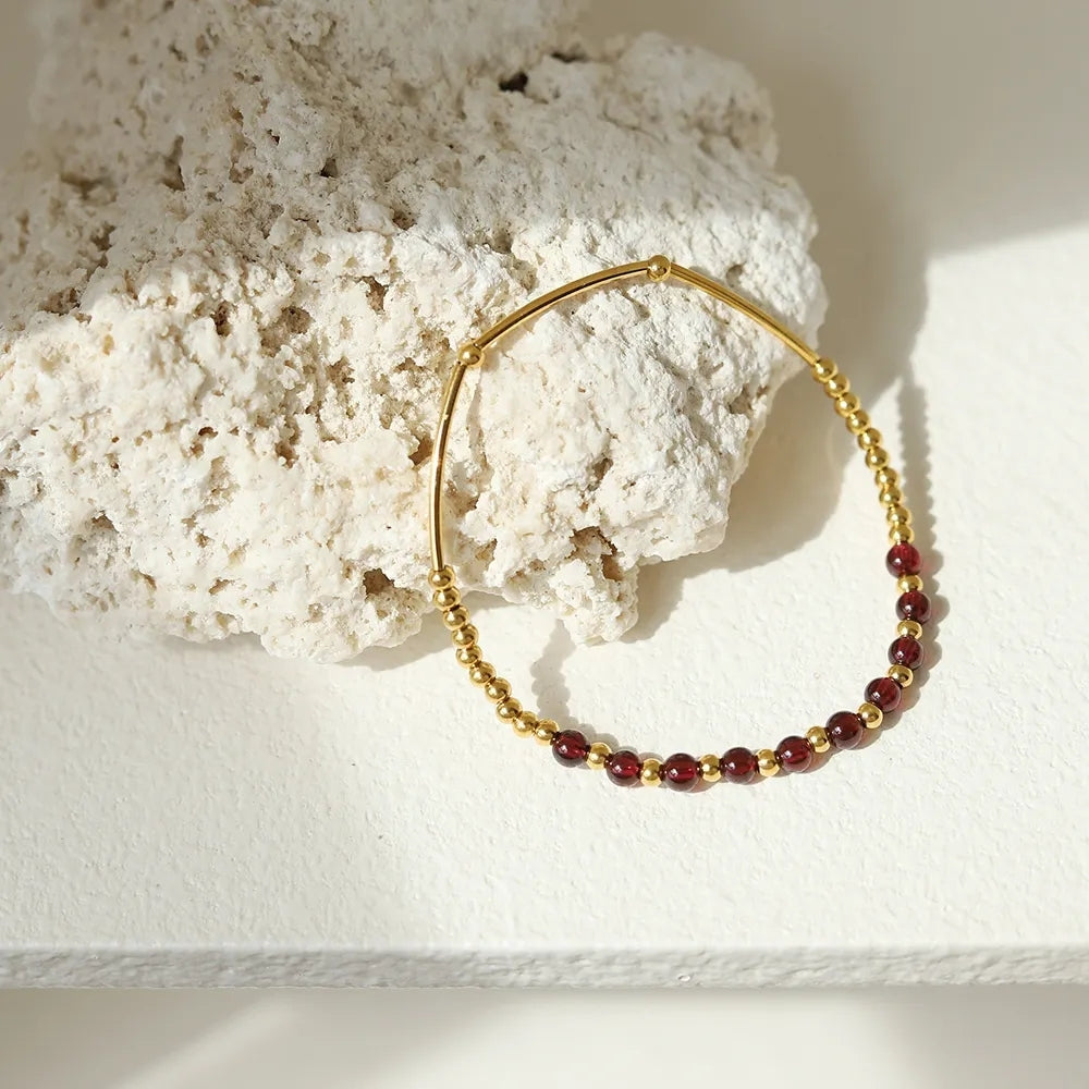 Waterproof garnet bead bracelet with gold stainless steel accents