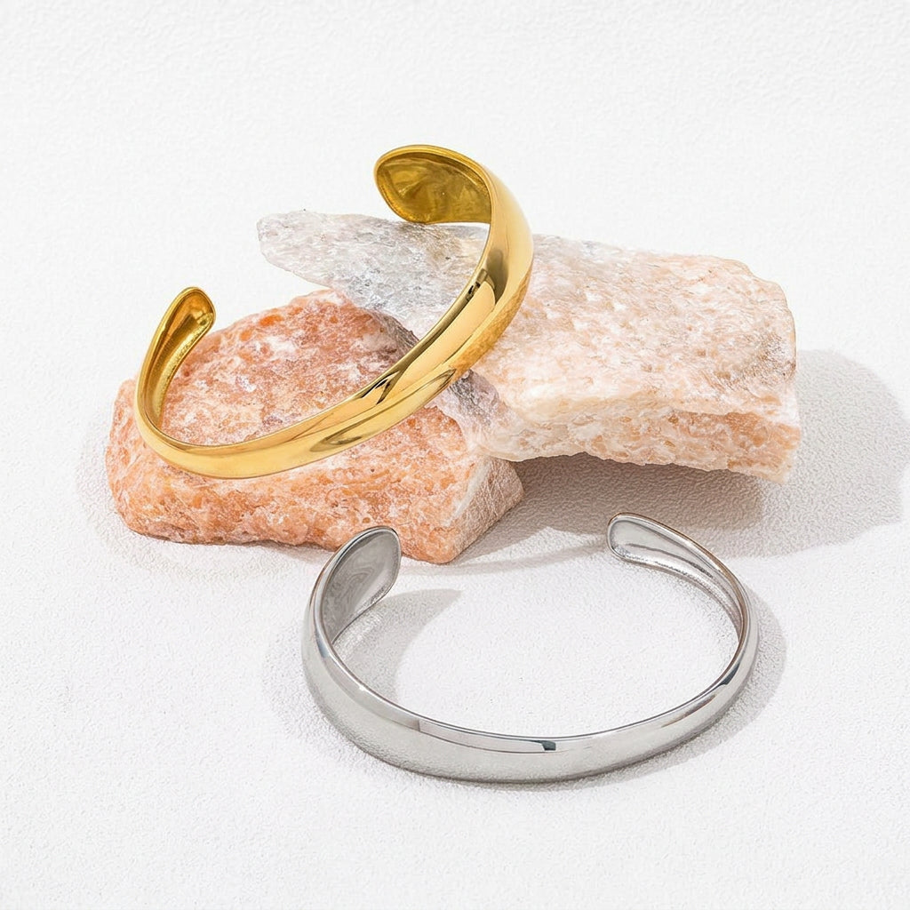 Modern silver cuff bracelet with curved sculptural finish