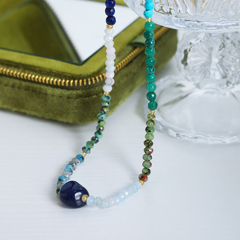 Colourful natural gemstone necklace with deep blue focal bead
